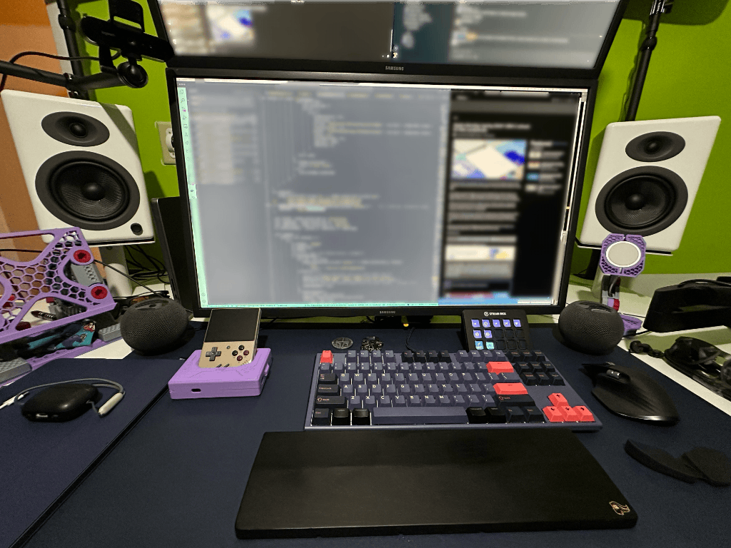 My desk with two vertically stacked 32-inch monitors